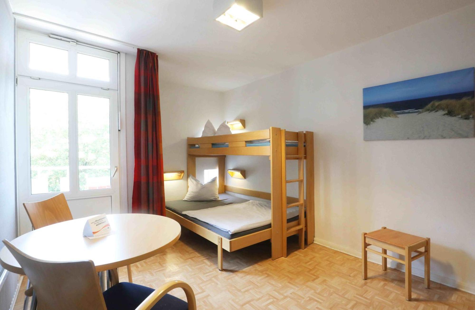 Tweepersoonskamer met 1 of 2 Bedden en Gedeelde Badkamer
